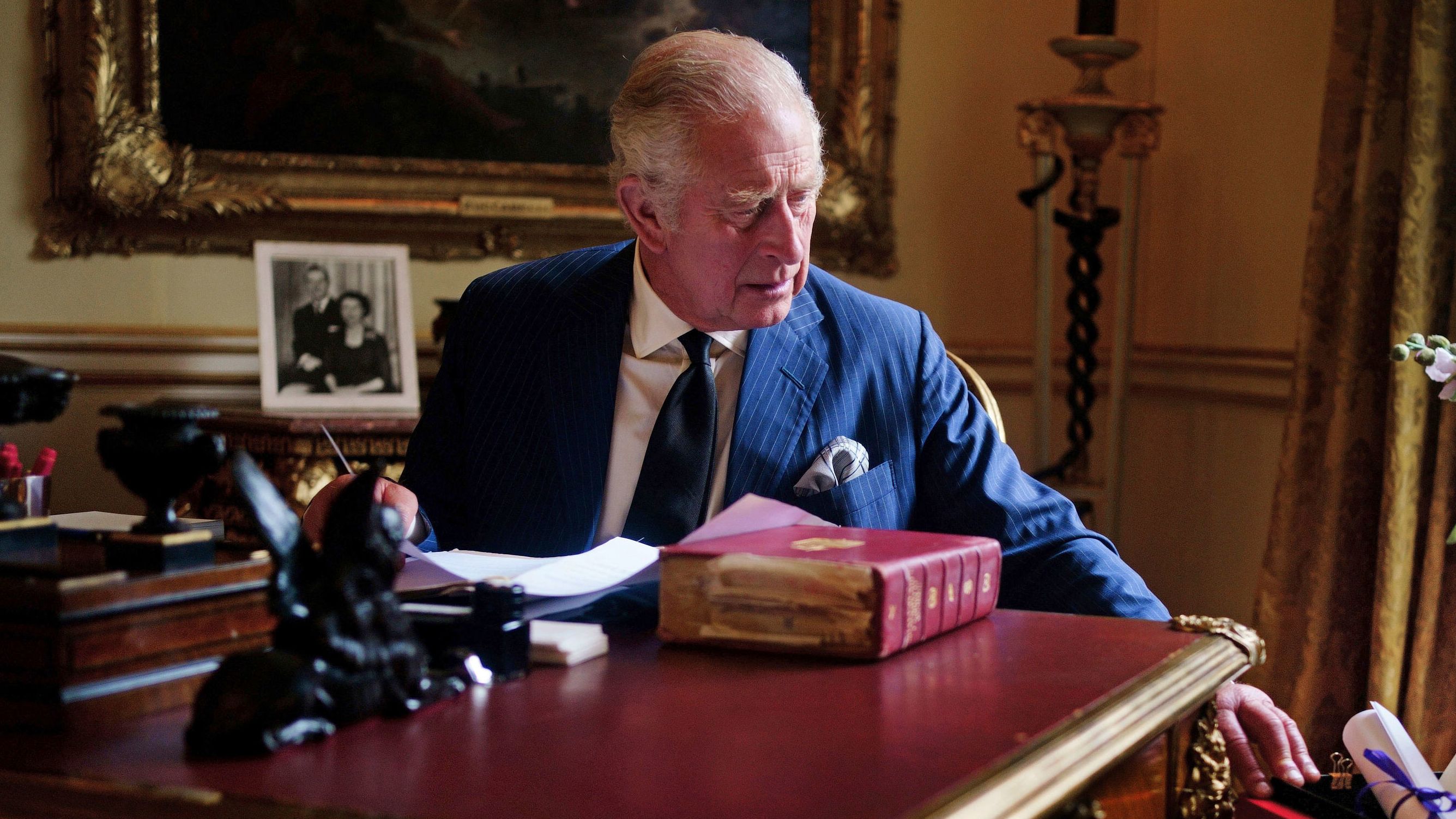 King Charles III is pictured in September carrying out official government duties at Buckingham Palace.