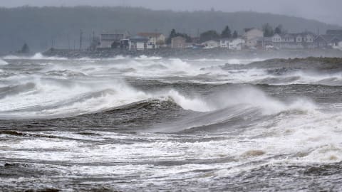 Waves pound the shore in Eastern Passage, N.S.  on Saturday, Sept. 24, 2022.   Strong rains and winds lashed the Atlantic Canada region as Fiona closed in early Saturday as a big, powerful post-tropical cyclone, and Canadian forecasters warned it could be one of the most severe storms in the country's history.