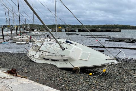 A sailboat washed ashore in Shearwater, Nova Scotia, on Saturday.