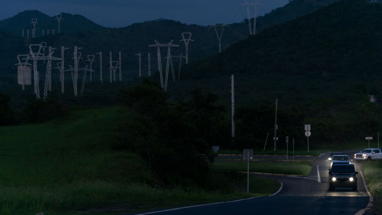 Power lines are seen at dusk in Guayama. Fiona knocked out power across the island, leaving half of its homes and businesses without lights five days after the storm. 