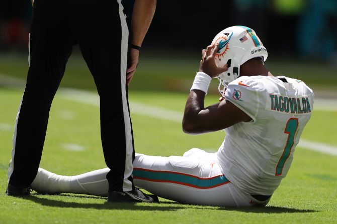 Dolphins QB Tua Tagovailoa sits on the turf in the second quarter of Miami's game against the Buffalo Bills. Tagovailoa was tackled by Matt Milano and his head hit the ground, causing the Miami man to be taken into the locker room to be evaluated for a concussion. He eventually came back to lead the Dolphins to victory, but the <a href="index.php?page=&url=https%3A%2F%2Fedition.cnn.com%2F2022%2F09%2F26%2Fsport%2Ftua-tagovailoa-miami-dolphins-buffalo-bills-spt-intl%2Findex.html" target="_blank">NFLPA is initiating a review of the injury and medical evaluation.</a>