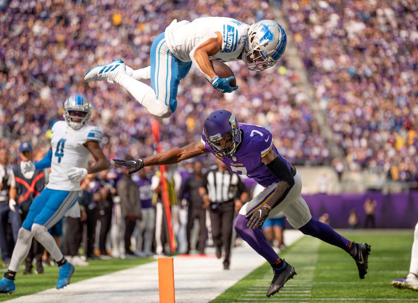 Who knew Lions could fly? Detroit wide receiver Amon-Ra St. Brown soars over Minnesota Vikings cornerback Patrick Peterson to pick up a first down at the two-yard line in the first quarter of their Week 3 clash. The Vikings won the game, 28-24, led by Kirk Cousins' 260 yards passing and two TD tosses, to go to 2-1 on the year.