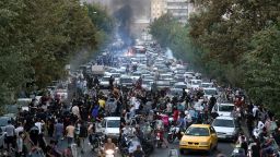 In this photo taken by an individual not employed by the Associated Press and obtained by the AP outside Iran, protesters chant slogans during a protest over the death of a woman who was detained by the morality police in downtown Tehran, Iran, on September 21, 2022. 