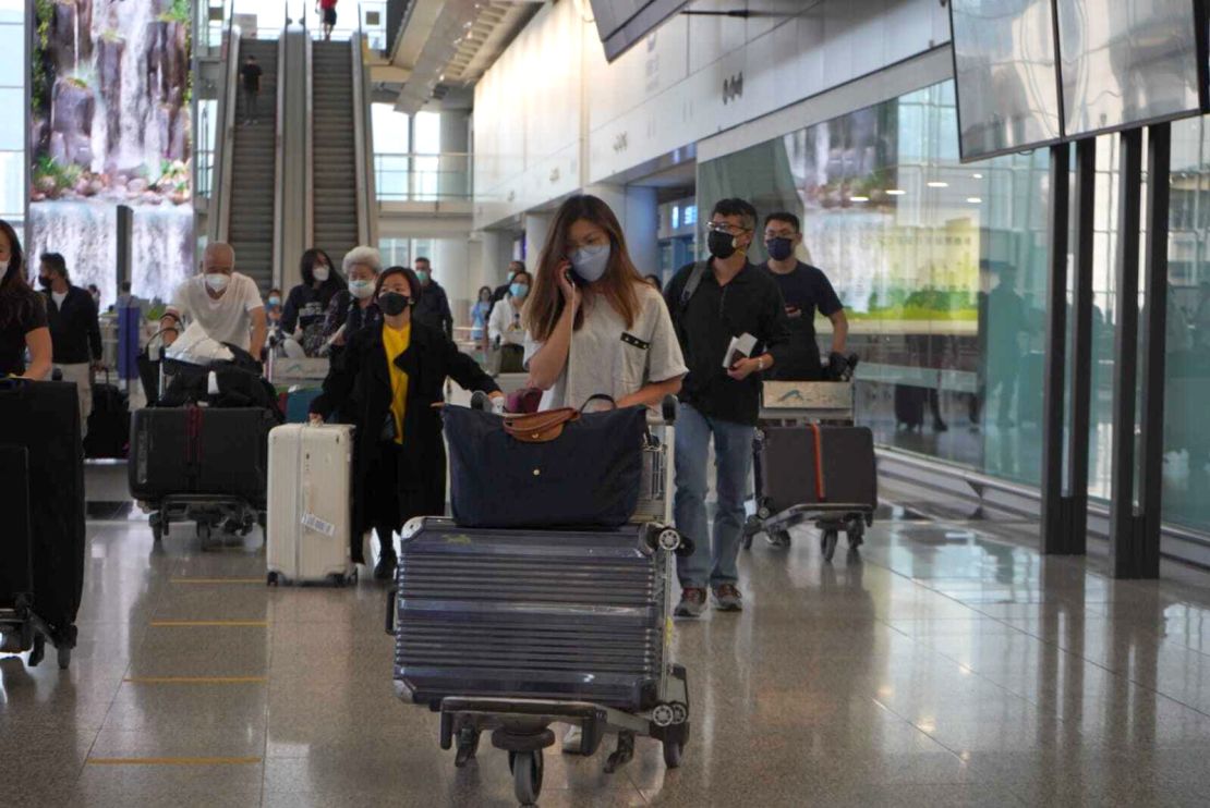 Passengers arriving at Hong Kong International Airport on Monday.