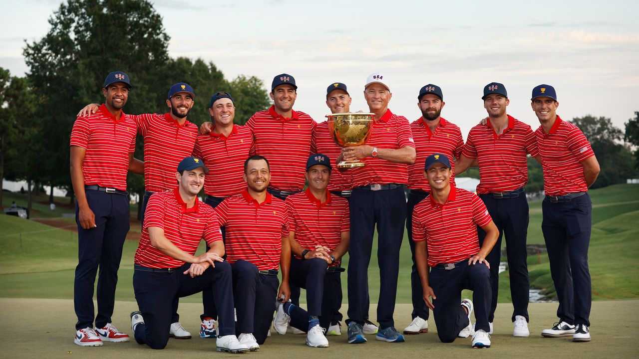The victorious US Team poses with the Presidents Cup trophy.