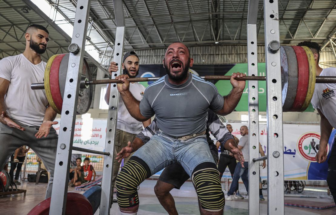 A Palestinian takes part in a weightlifting championship in the southern Gaza Strip town of Khan Yunis on Saturday. 