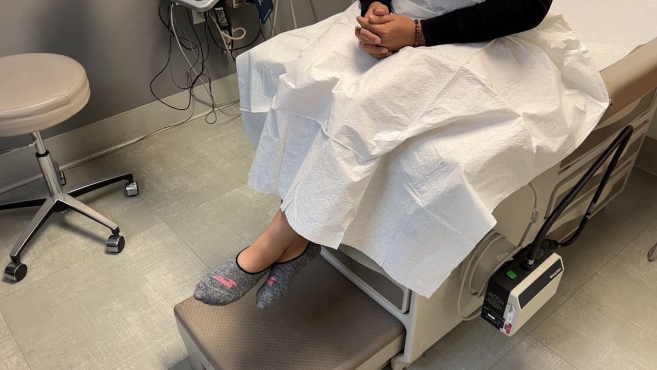 The woman waits for her check-up. She will then need to wait another 24 hours for the abortion.