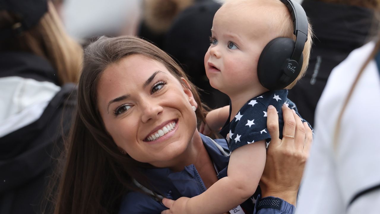 Jordan Spieth's wife, Annie, holds their son Sammy during Sunday's singles matches.