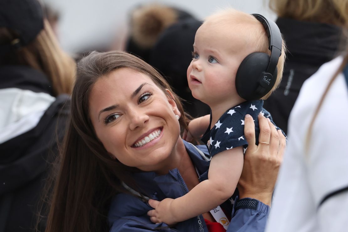 Jordan Spieth's wife, Annie, holds their son Sammy during Sunday's singles matches.