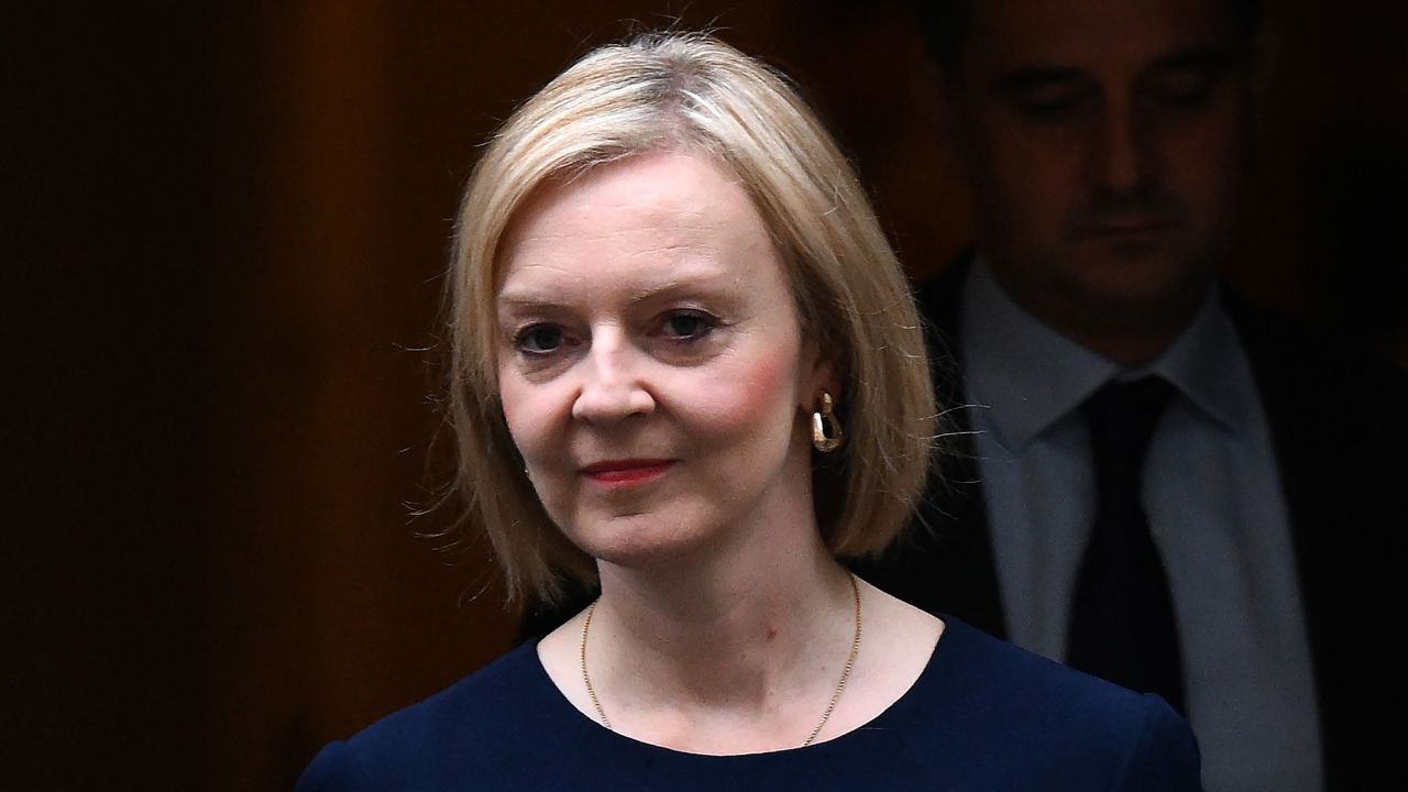 Britain's Prime Minister Liz Truss walks out of Number 10 Downing Street on her way to the House of Commons for the government's anti-inflation budget plan in London on September 23, 2022. 