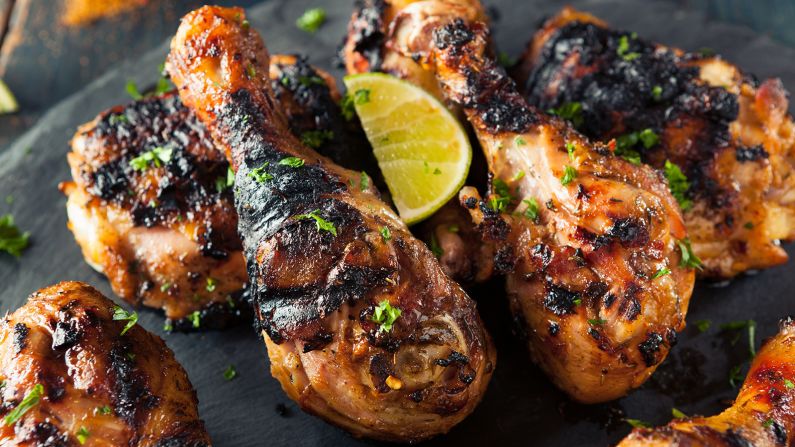 <strong>Jerk chicken, Jamaica:</strong> Scotch bonnets star in several of Jamaica's iconic dishes, including escovitch fish, pepper pot soup and curry goat. But you might recognize them most from the ubiquitous jerk chicken and pork smoking roadside across the island.
