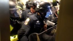 Video from January 6 shows Fanone and other officers trying to keep the protestors from coming through the door. 