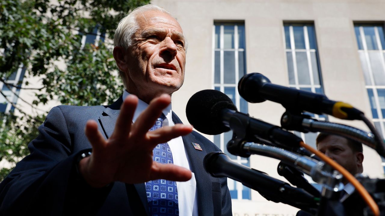 WASHINGTON, DC - AUGUST 31: Former Trump White House Advisor Peter Navarro talks briefly with reporters after appearing in federal district court for a motion hearing at the Prettyman Courthouse on August 31, 2022 in Washington, DC. Navarro has been indicted by a grand jury on two counts of contempt of Congress. (Photo by Chip Somodevilla/Getty Images)