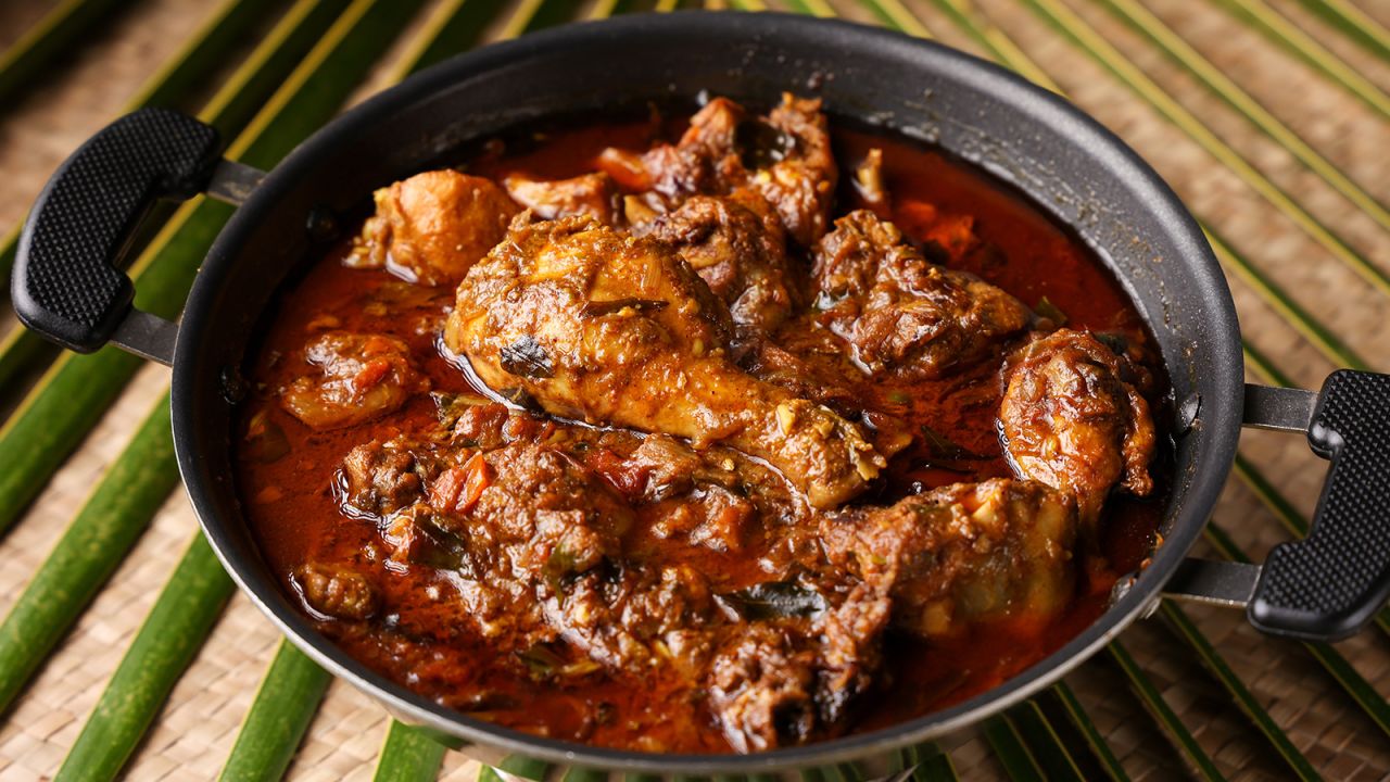 Chicken is simmered with roasted spices and coconut in this flavorful dish.