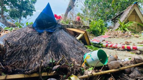 Typhoon Noru toppled huts and coconut trees on the beach at Sugod Beach and Food Park on Polillo Island, Quezon Province, Philippines.