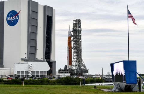NASA's Artemis I rocket rolls back to the Vehicle Assembly Building at the Kennedy Space Center in Cape Canaveral, Florida, on Tuesday, September 27. The launch of the rocket was postponed due to the impending arrival of Hurricane Ian.
