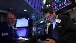 Traders work on the floor of the New York Stock Exchange (NYSE) in New York City, U.S., September 26, 2022. 