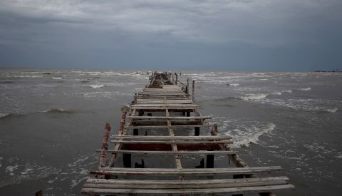 Waves kick up under a dark sky along the shore of Batabano as Hurricane Ian reaches the island on Monday, September 26.