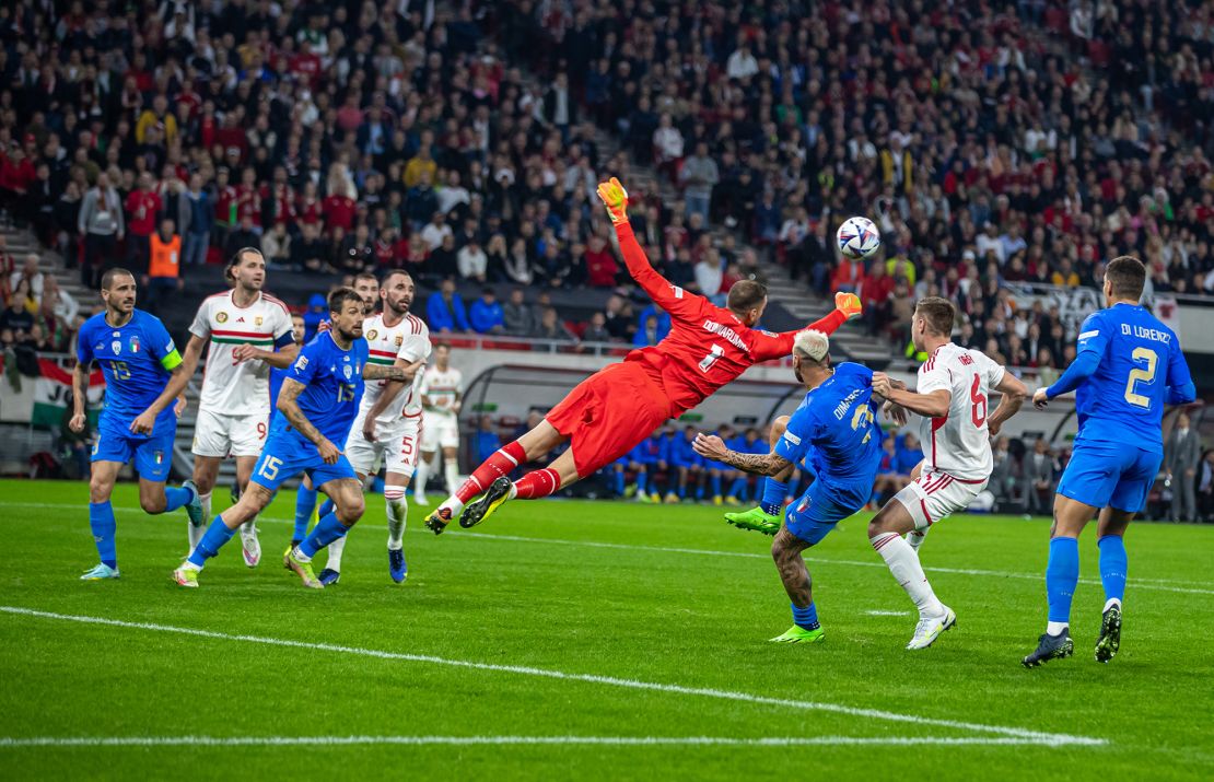 Italy defended resolutely to deny a spirited comeback attempt from Hungary.