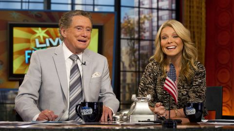 (L to R) Regis Philbin and Kelly Ripa appear on set during a taping of 