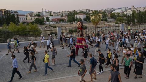 Little Amal performs "Ariadne's Thread" from Ancient Greek mythology while walking in Athens, Greece, on September 2, 2021.