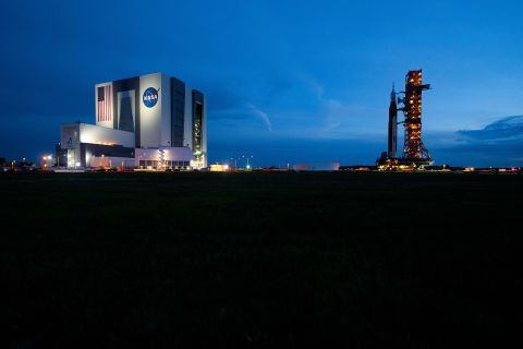 NASA's Artemis I rocket rolls back to the Vehicle Assembly Building at the Kennedy Space Center in Cape Canaveral, Florida, on Tuesday. The launch of the rocket was postponed due to the impending arrival of Hurricane Ian.