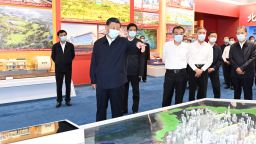 Xi Jinping and other top Chinese leaders visit an exhibition themed "Forging Ahead in the New Era" at the Beijing Exhibition Hall on Tuesday.