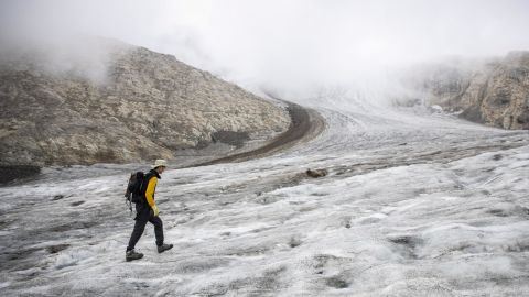 Huss walking on the Gries glacier.