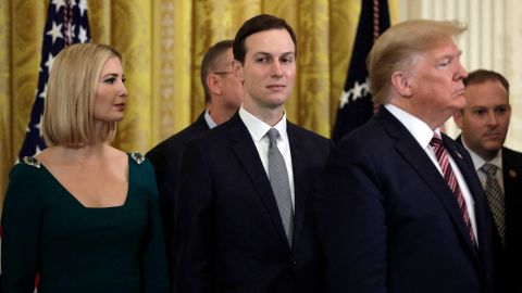 President Donald Trump with his daughter Ivanka Trump and her husband Jared Kushner attend a Hanukkah reception at the White House in Washington on December 11, 2019.