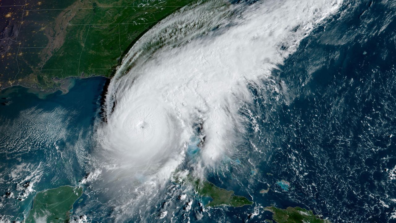 A satellite image from the National Oceanic and Atmospheric Administration shows Hurricane Ian approaching Florida on Wednesday at 9:01 a.m. ET.