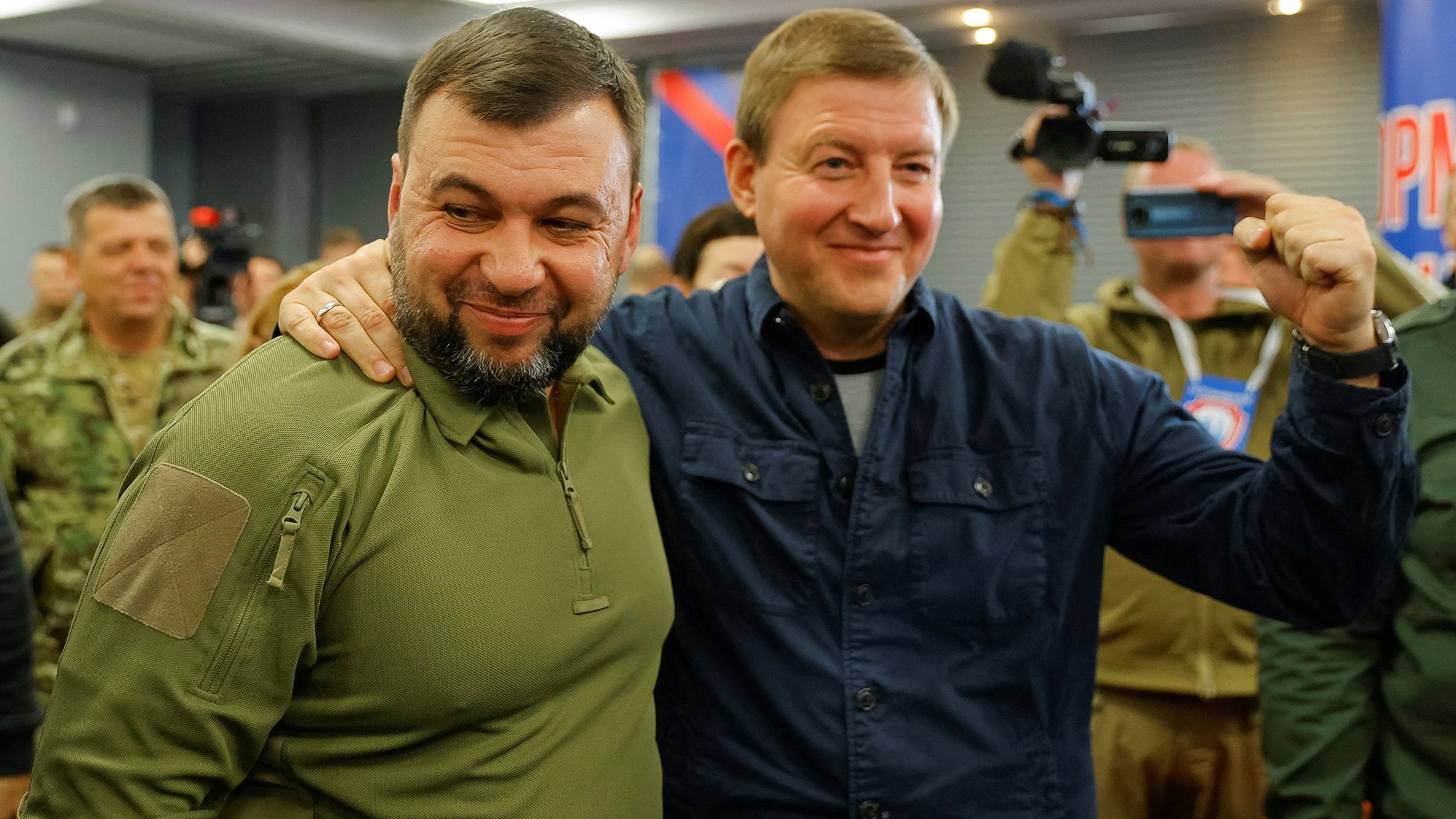Head of the separatist self-proclaimed Donetsk People's Republic (DPR) Denis Pushilin, left, and Secretary of the United Russia Party's General Council Andrey Turchak attend a news conference on preliminary <a href="https://edition.cnn.com/europe/live-news/russia-ukraine-war-news-09-28-22/h_8def30f207fe9997f5a09a7144e0afaf" target="_blank">results of a referendum on the joining of the DPR to Russia,</a> in Donetsk, Ukraine, on September 27.