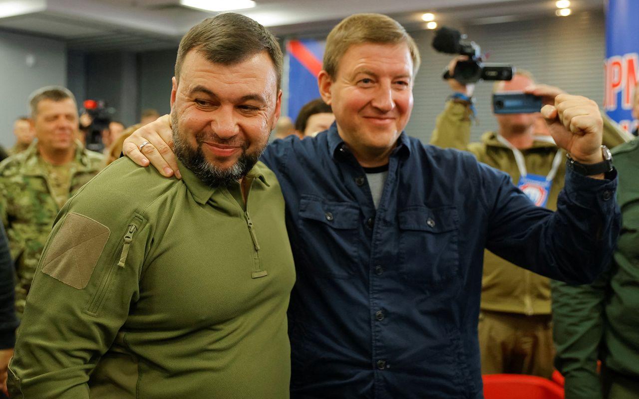 Head of the separatist self-proclaimed Donetsk People's Republic (DPR) Denis Pushilin, left, and Secretary of the United Russia Party's General Council Andrey Turchak attend a news conference on preliminary <a rel=