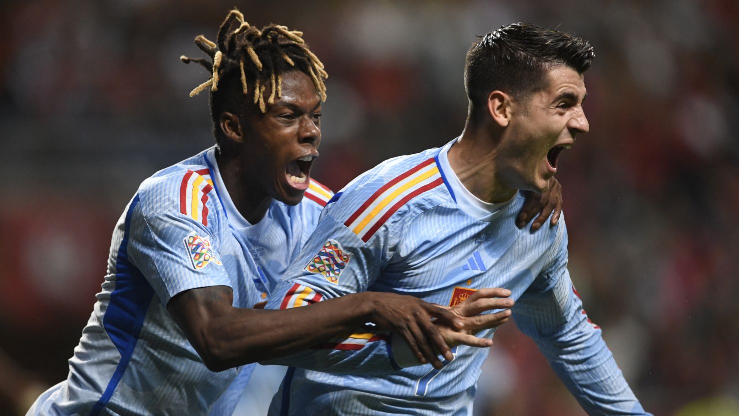álvaro Morata (right) and Nico Williams celebrate Spain's late winner against Portugal.