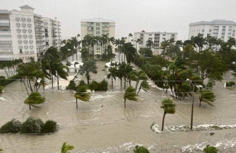 The streets of Naples, Florida, are flooded on Wednesday. City officials asked residents to <a target=