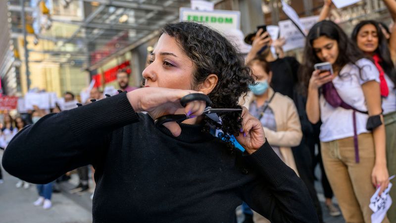 grief-protest-and-power-why-iranian-women-are-cutting-their-hair-or-cnn