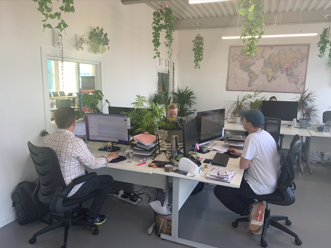 Employees of 5 Squirrels, a skincare manufacturing company in southern England, during 'deep work time' in the office, where they can focus on projects without email interruptions.