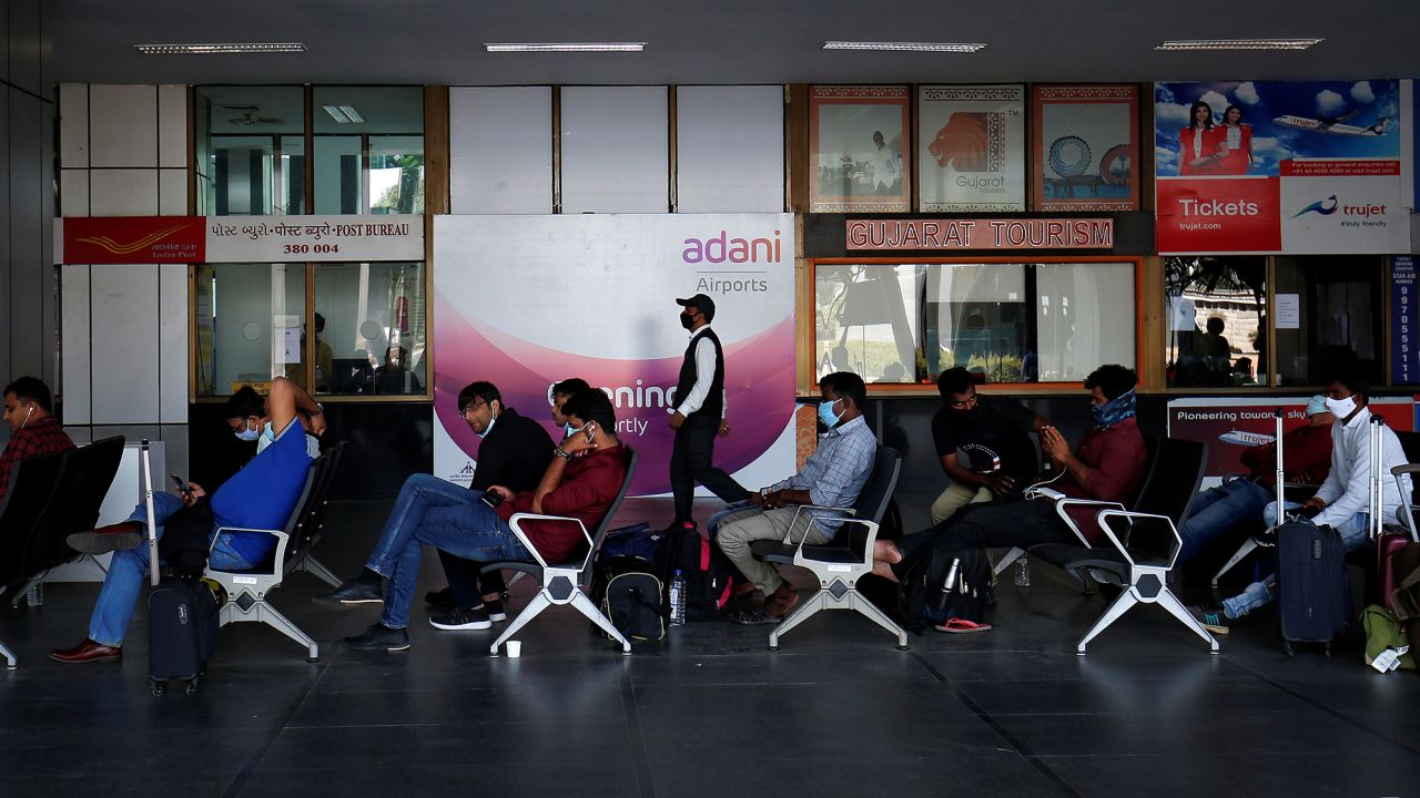 Passengers in a departure lounge after Adani Group took over operations at Sardar Vallabhbhai Patel International Airport in Ahmedabad, India, in November 2020.