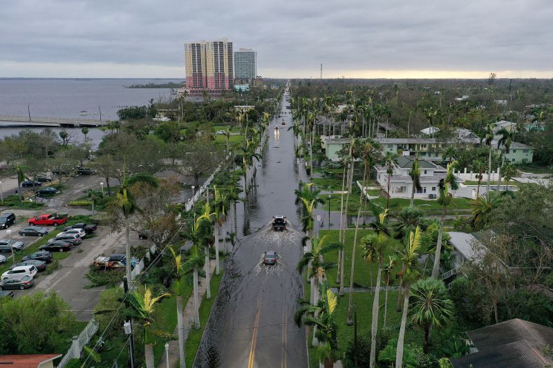 Rescuers are pulling people off roofs in Florida's flooded disaster zone, with Lee County hit the hardest. One death reported in Osceola County.