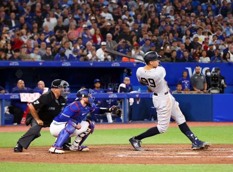 Wife of Toronto Blue Jays coach jokes about ‘divorce’ after watching her husband give away Aaron Judge’s lucrative home run ball | CNN