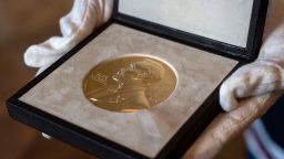 FILE - A Tuesday, Dec. 8, 2020 file photo of a Nobel Prize medal. The Nobel Peace Prize will be awarded on Friday Oct. 8, 2021.(AP Photo/Jacquelyn Martin, File)