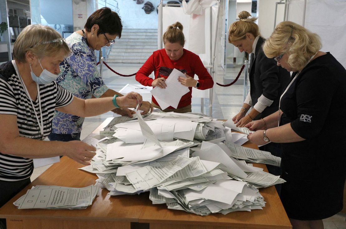 Members of a local electoral commission count ballots at a polling station in Crimea  on September 27 following a referendum on the joining of Russian-controlled regions of Ukraine to Russia.