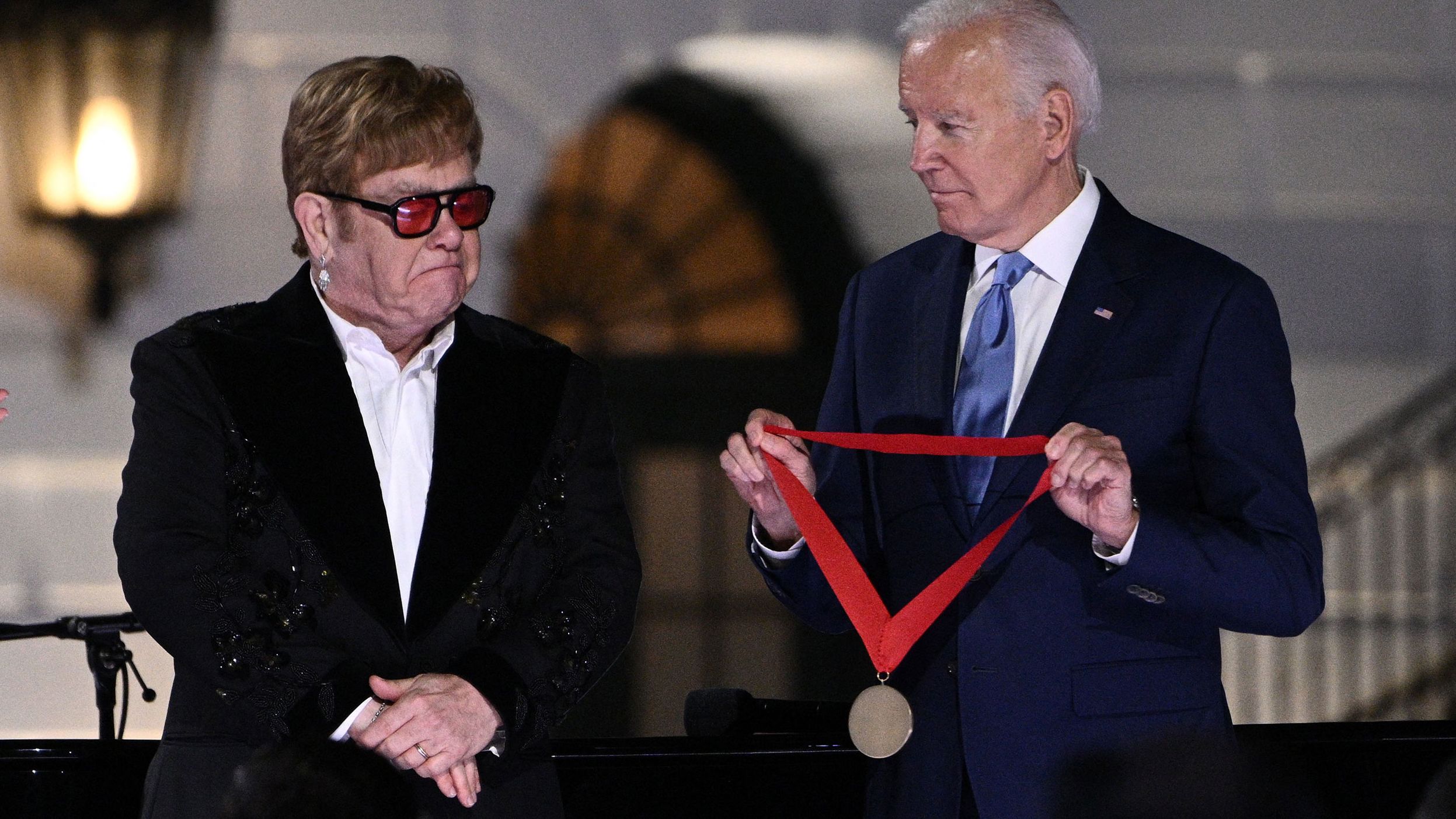 Singer Elton John becomes emotional as US President Joe Biden <a href="https://www.cnn.com/2022/09/23/politics/elton-john-humanities-medal-white-house-performance-biden/index.html" target="_blank">presents him with the National Humanities Medal</a> at the end of a concert held on the South Lawn of the White House on Friday, September 23. John performed a number of hit songs during "A Night When Hope and History Rhyme," a concert in collaboration with A&E Networks and The History Channel.
