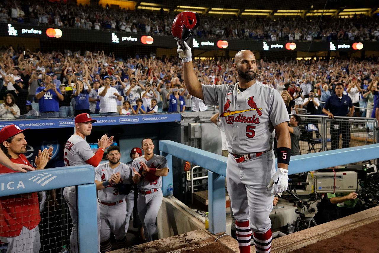 St. Louis' Albert Pujols acknowledges the crowd in Los Angeles after <a href="https://www.cnn.com/2022/09/23/sport/albert-pujols-700-career-home-runs-spt" target="_blank">hitting his 700th career home run</a> on Friday, September 23. He is only the fourth player in Major League Baseball history to hit 700 home runs, joining Barry Bonds, Hank Aaron and Babe Ruth.