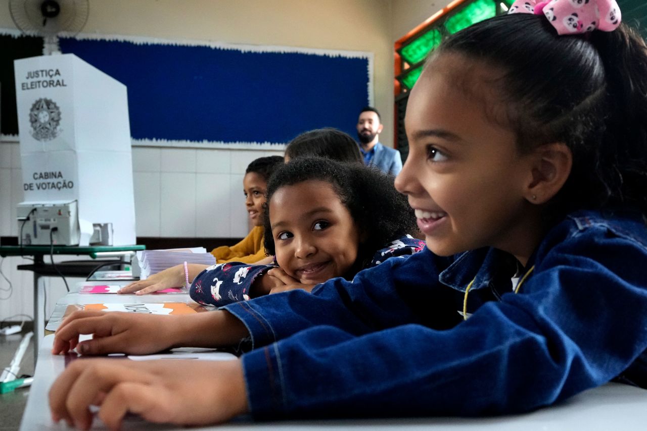 Students participate in a simulated election at a public school in Brasilia, Brazil, on Friday, September 23. Brazilians <a href="https://www.cnn.com/2022/09/29/americas/brazil-election-violence-fears-intl-latam" target="_blank">head to the polls</a> for the real election on Sunday, October 2.
