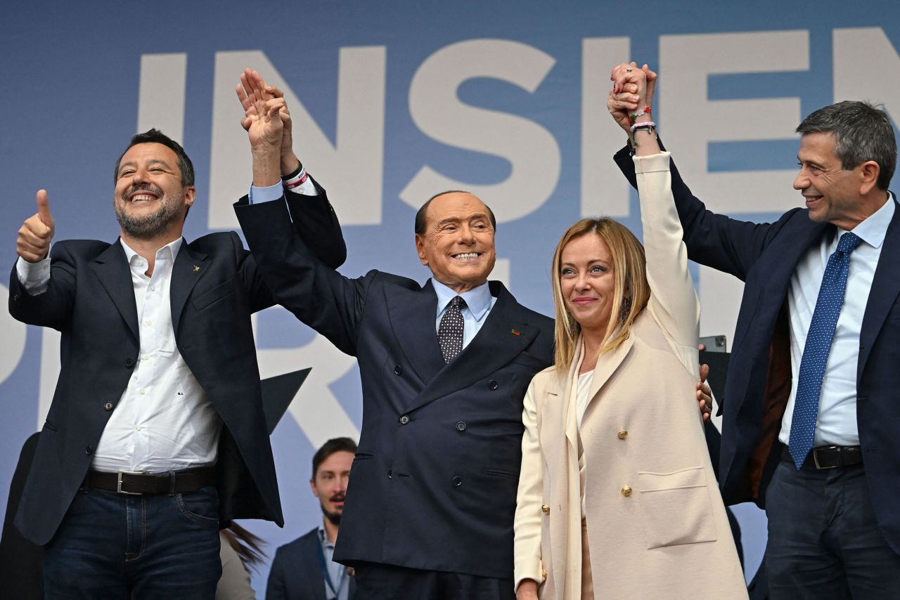 From left, Italian political leaders Matteo Salvini, Silvio Berlusconi, Giorgia Meloni and Maurizio Lupi stand on stage Thursday, September 22, during a rally of the country's coalition of right-wing political parties. Meloni later claimed victory in a general election <a href="https://www.cnn.com/2022/09/25/europe/italy-election-results-intl/index.html" target="_blank">set to install her as Italy's first female prime minister.</a>