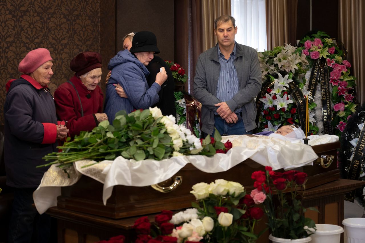 People react Wednesday, September 28, as they attend a farewell to teacher Natalya Vedernikova, one of the victims of a <a href="https://www.cnn.com/2022/09/26/europe/izhevsk-school-shooting-russia-intl" target="_blank">school shooting</a> in Izhevsk, Russia. At least 11 children were killed on Monday when a gunman wearing Nazi symbols opened fire at the school, Russian authorities said Monday. Investigators said 24 people, including 22 children, were injured.