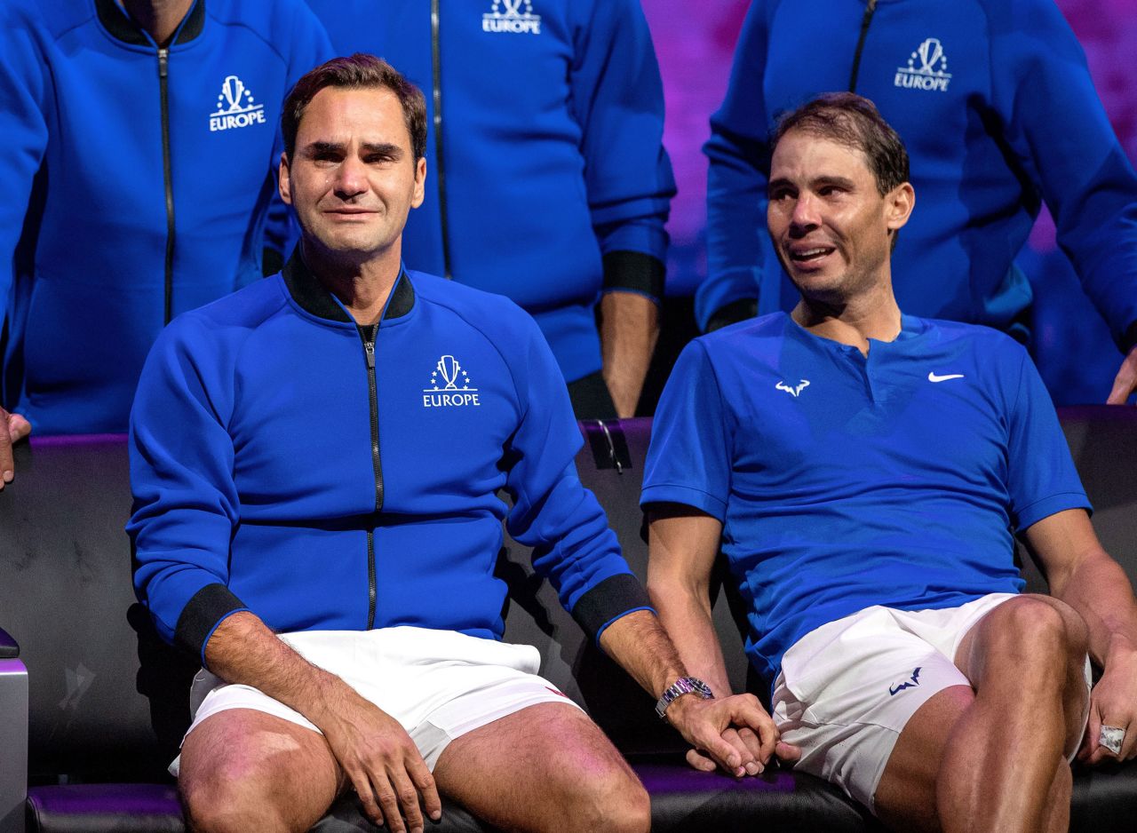 Tennis great <a href="http://www.cnn.com/2022/09/22/tennis/gallery/roger-federer/index.html" target="_blank">Roger Federer,</a> left, holds the hand of rival Rafael Nadal after they teamed up for the final match of Federer's career on Friday, September 23. <a href="https://www.cnn.com/2022/09/29/tennis/roger-federer-rafa-nadal-photo-ella-ling-tennis-spt-intl/index.html" target="_blank">The two became emotional</a> during the post-match ceremony at the Laver Cup in London.
