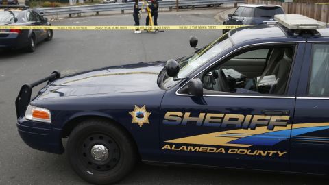 California law states that anyone who wants to be a peace offiicer must pass a psychological evaluation. Leaders of the Alameda County Sheriff's Office, whose crime scene technicians are seen in the photo gathering evidence, say they were told differently.