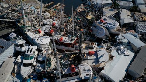 In this aerial view, boats sit atop one another in a marina near Fort Myers Beach in San Carlos Island, Florida.