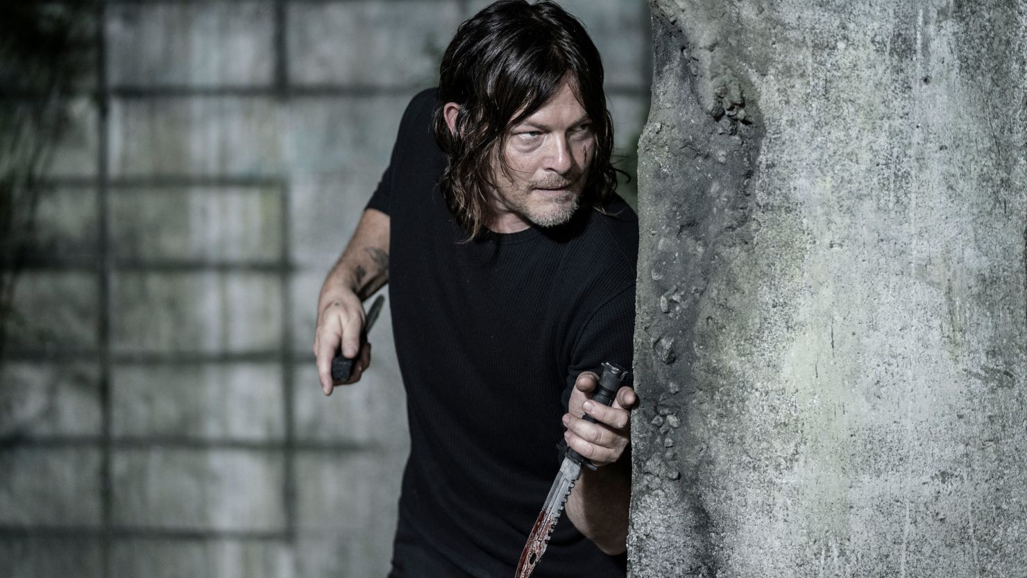 Norman Reedus as Daryl Dixon in 'The Walking Dead,' a character whose story will continue in a spinoff series.